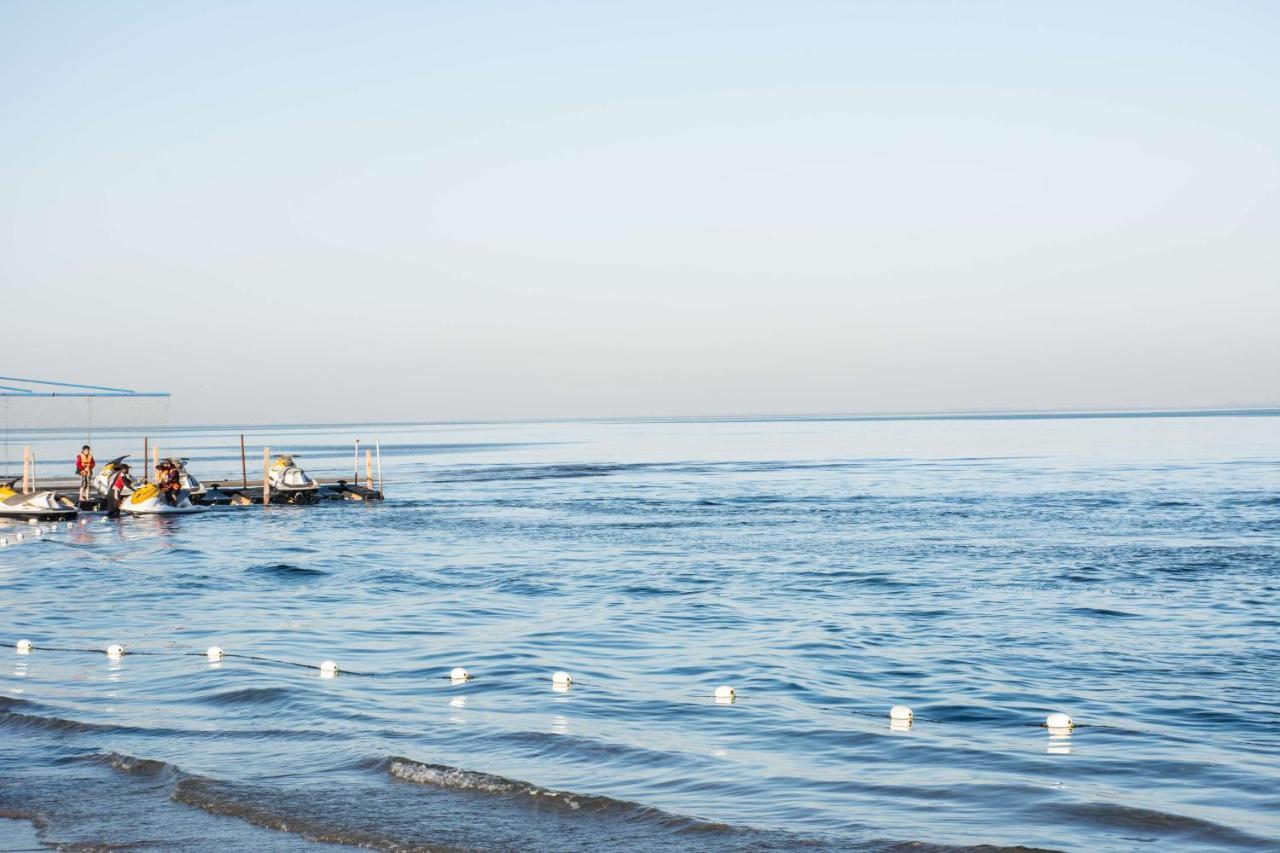 Radisson Blu Resort, Al Khobar Bahía de la Media Luna Exterior foto View of the sea from the beach